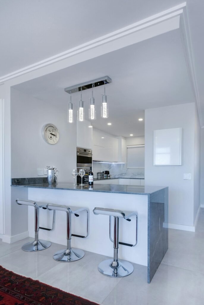 Integrated microwave and oven with matching cabinetry in Marietta remodel